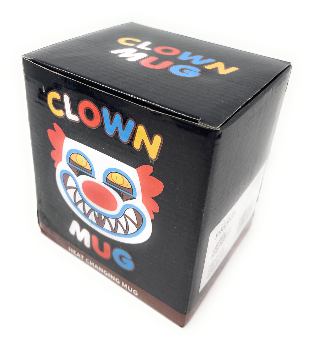 A black cardboard mystery box for a heat changing clown mug, featuring a colorful clown face graphic and the words 'CLOWN MUG' 