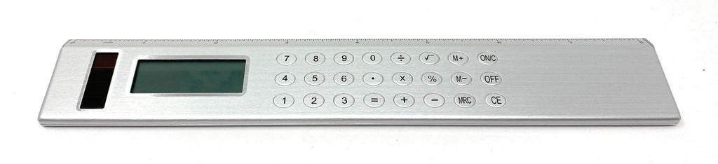 Silver Solar Powered Calculator on an  8-inch Ruler