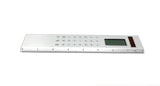 Silver Solar Powered Calculator on an  8-inch Ruler