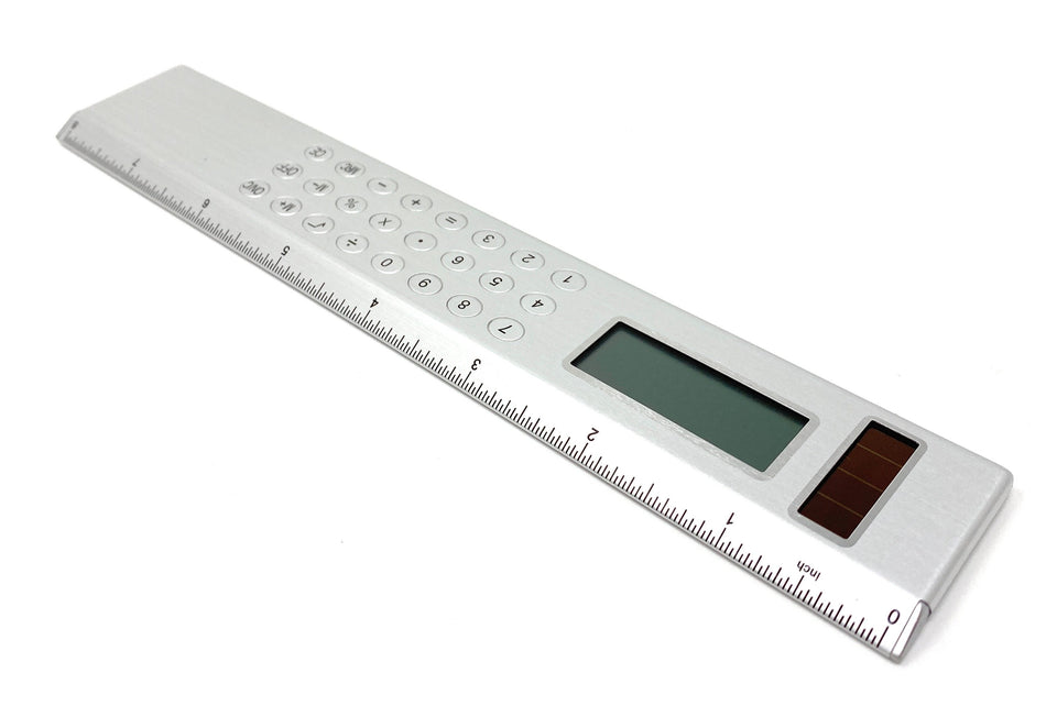Silver Solar Powered Calculator on an  8-inch Ruler